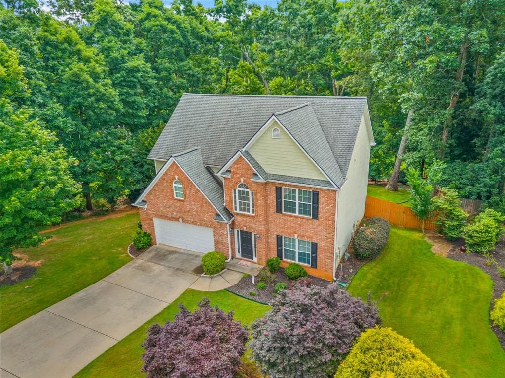 4 bedroom, 3 bathroom, 2,576 sq ft single family residence for sale at 6459 Millstone Cove Drive, Flowery Branch, GA 30542 — photo 3