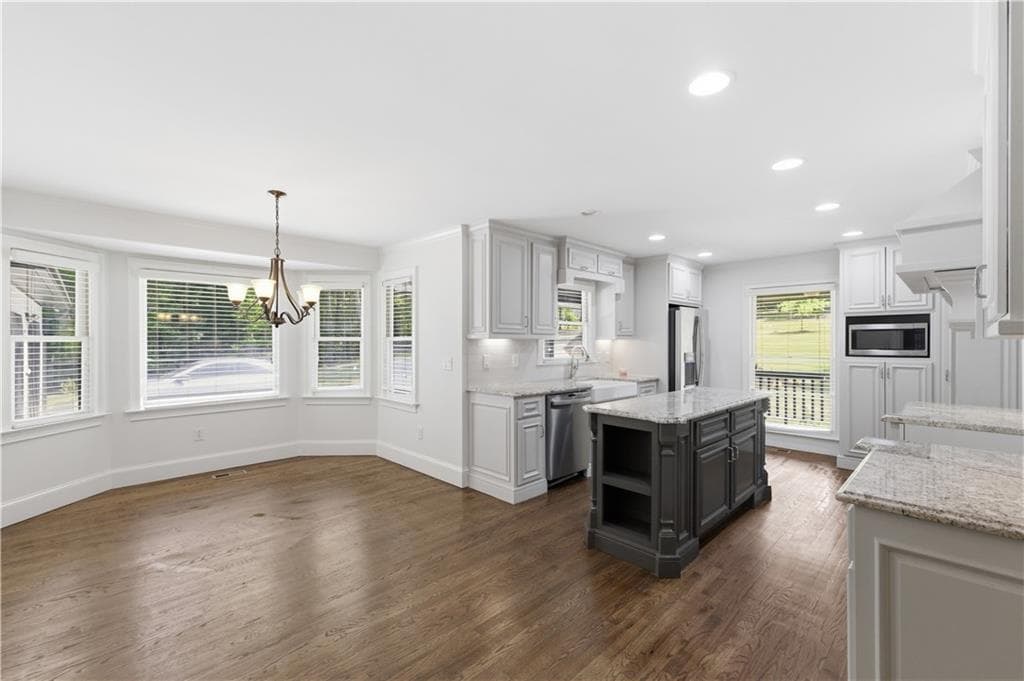 5 bedroom, 6 bathroom, 6,369 sq ft single family residence for sale at 3380 Wildwood Road, Suwanee, GA 30024 — photo 10