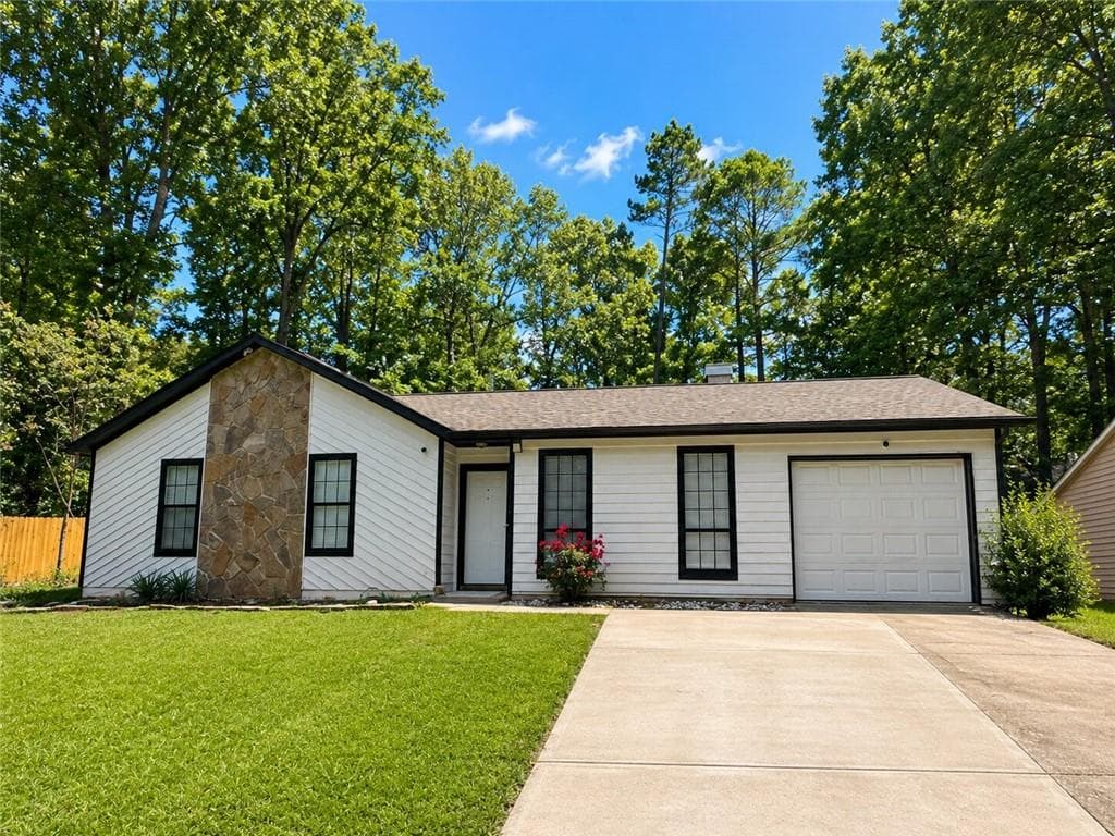 3 bedroom, 2 bathroom, 1,229 sq ft single family residence for sale at 824 Greenhedge Drive, Stone Mountain, GA 30088