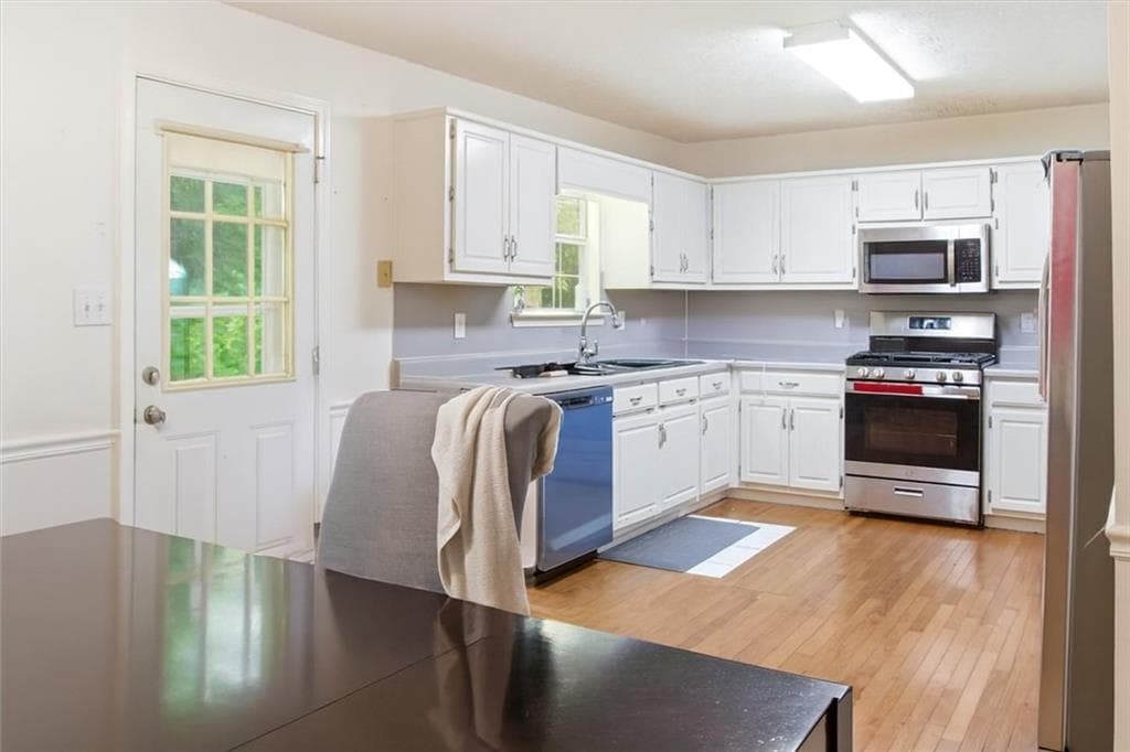 4 bedroom, 3 bathroom, 2,398 sq ft single family residence for sale at 4579 Adams Court, Rex, GA 30273 — photo 2