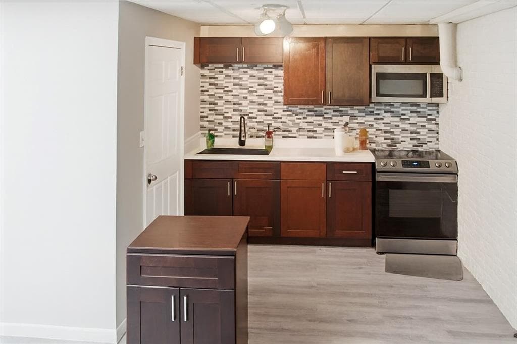 4 bedroom, 3 bathroom, 2,398 sq ft single family residence for sale at 4579 Adams Court, Rex, GA 30273 — photo 5