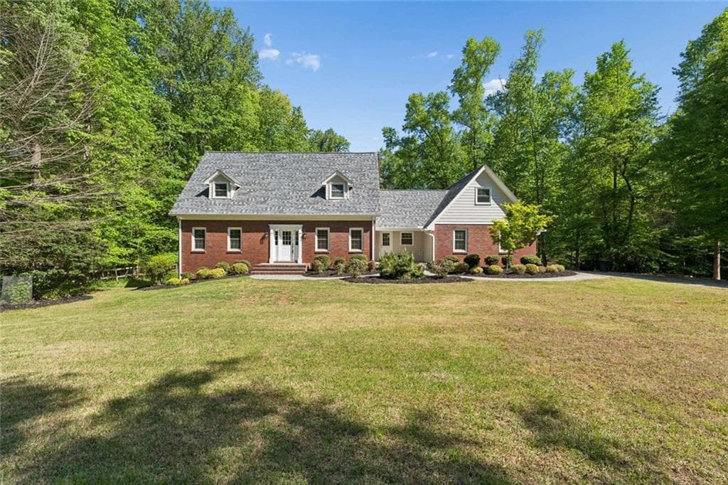 4 bedroom, 3 bathroom, 3,901 sq ft single family residence under contract at 14030 Cogburn Road, Milton, GA 30004 — photo 2
