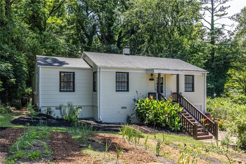 3 bedroom, 2 bathroom, 1,181 sq ft single family residence for sale at 1909 Lisbon Drive, Atlanta, GA 30310 — photo 2