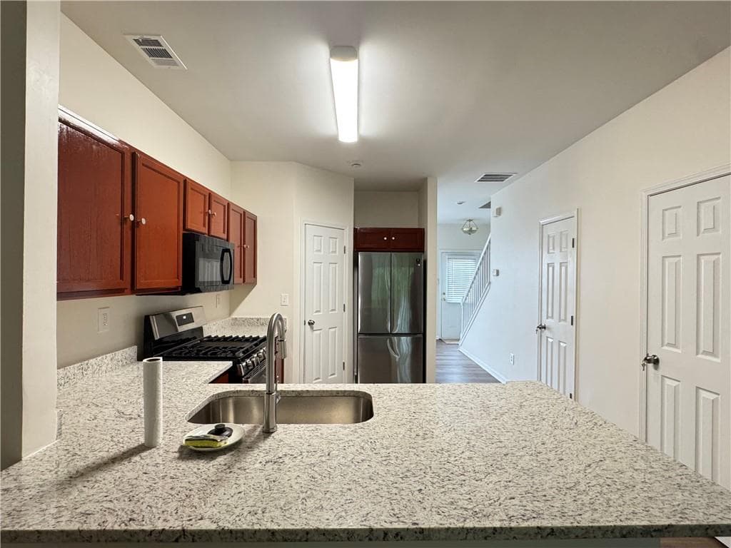 2 bedroom, 3 bathroom, 1,228 sq ft townhouse for sale at 1599 Cove Creek Circle, Norcross, GA 30093 — photo 3