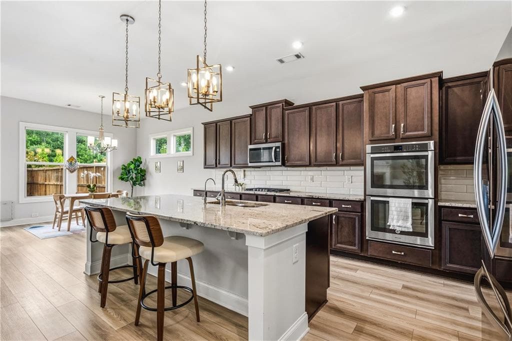 3 bedroom, 2 bathroom, 2,149 sq ft single family residence for sale at 3665 Summerpoint Crossing, Cumming, GA 30028 — photo 3