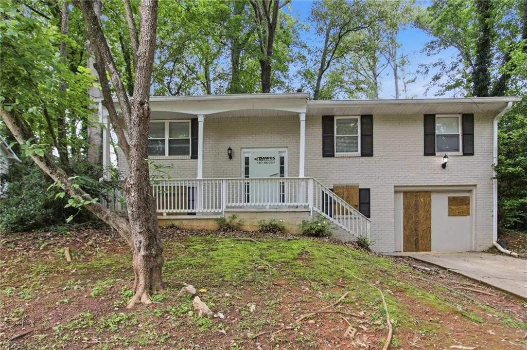 5 bedroom, 3 bathroom, 2,322 sq ft single family residence for sale at 4436 Malibu Drive, Decatur, GA 30035 — photo 1 of 39