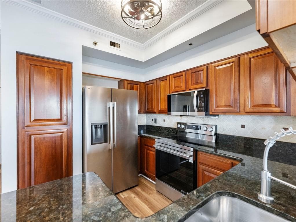 1 bedroom, 1 bathroom, 941 sq ft condominium for sale at 795 Hammond Drive 2203, Atlanta, GA 30328 — photo 3