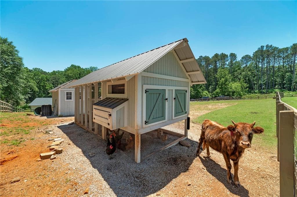 5 bedroom, 5 bathroom, 3,824 sq ft single family residence for sale at 6455 Maddux Path, Cumming, GA 30028 — photo 7