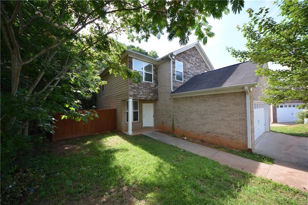 4 bedroom, 3 bathroom, 1,888 sq ft single family residence for sale at 1550 Persimmon Trace, Morrow, GA 30260 — photo 4