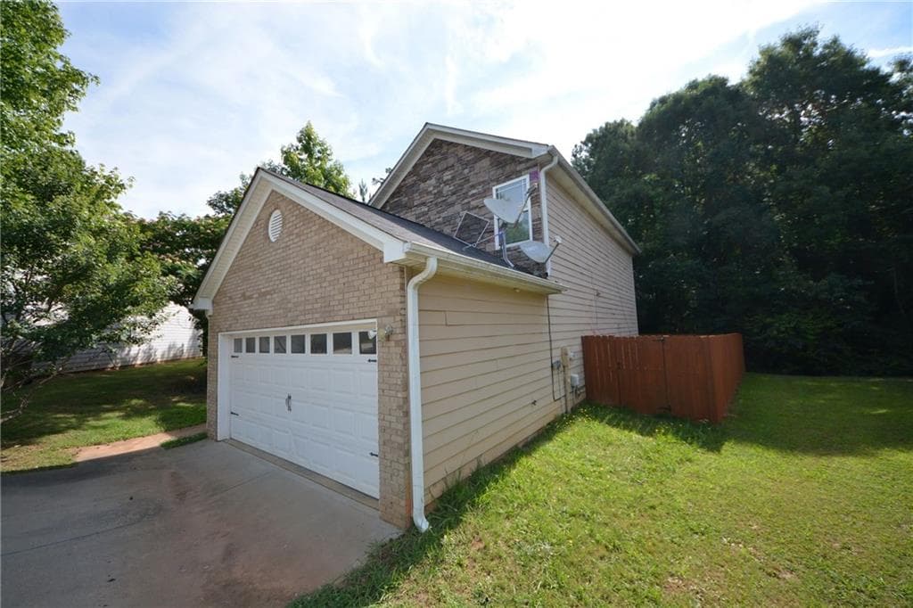 4 bedroom, 3 bathroom, 1,888 sq ft single family residence for sale at 1550 Persimmon Trace, Morrow, GA 30260 — photo 5
