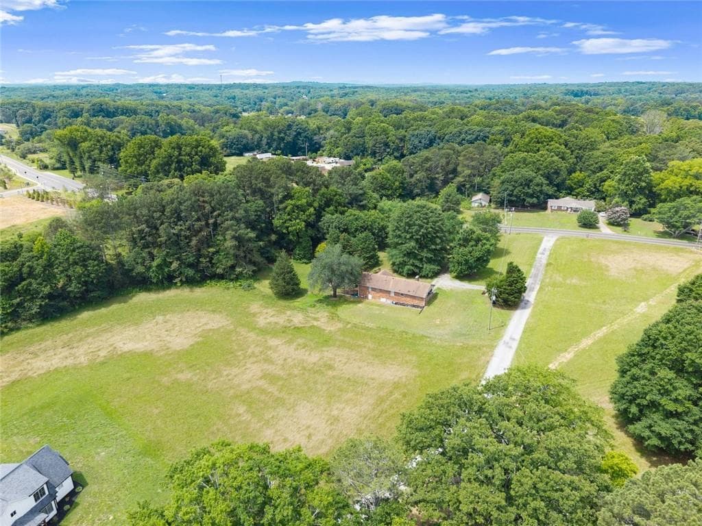 3 bedroom, 2 bathroom, 1,371 sq ft single family residence for sale at 5590 Howard Road, Cumming, GA 30040 — photo 4