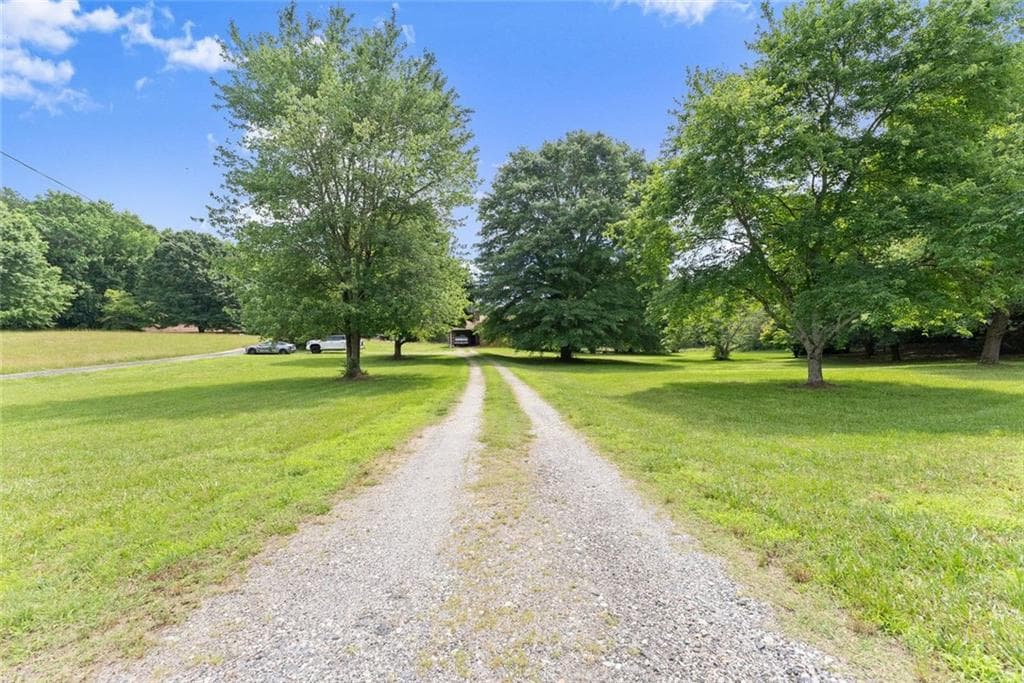 3 bedroom, 2 bathroom, 1,371 sq ft single family residence for sale at 5590 Howard Road, Cumming, GA 30040 — photo 9