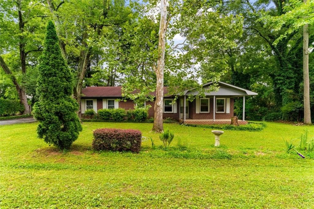 3 bedroom, 1 bathroom, 1,408 sq ft single family residence for sale at 156 Parker Road, Calhoun, GA 30701 — photo 4