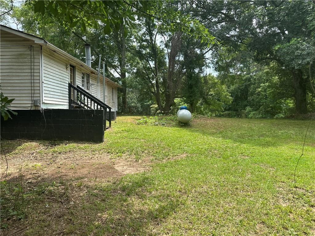 3 bedroom, 1 bathroom, 1,048 sq ft single family residence for sale at 155 Old Stage Coach Road, Stockbridge, GA 30281 — photo 2