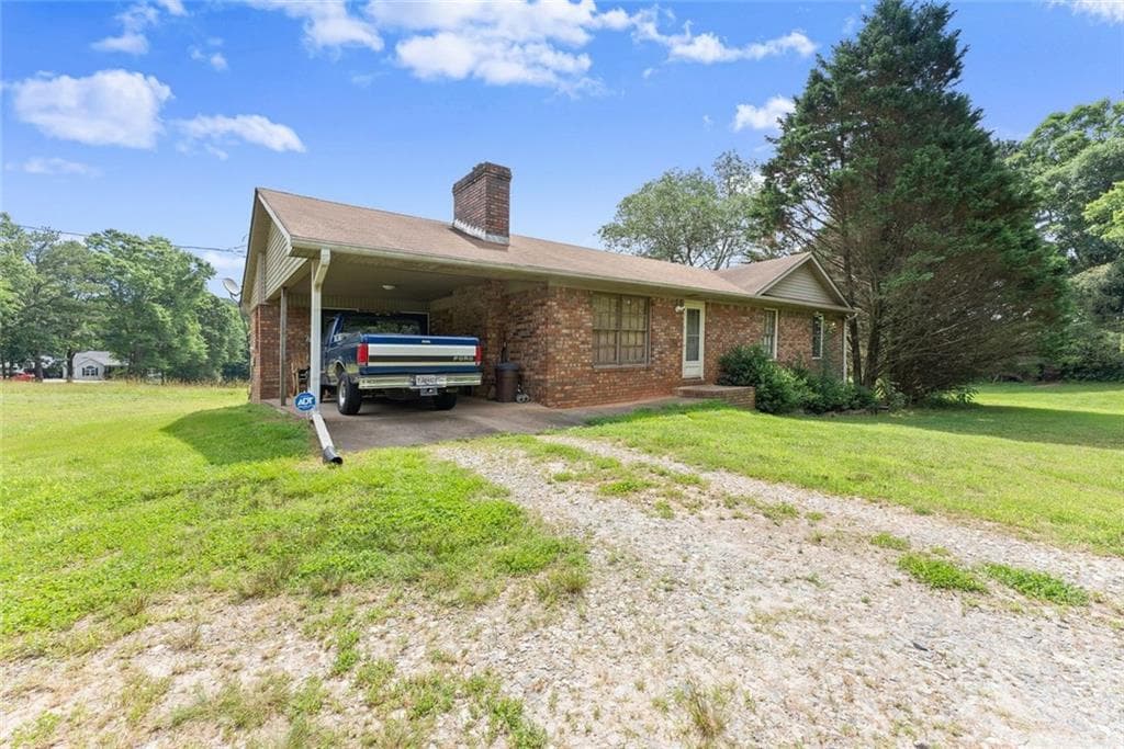 3 bedroom, 2 bathroom, 1,371 sq ft single family residence for sale at 5590 A Howard Road, Cumming, GA 30040 — photo 7