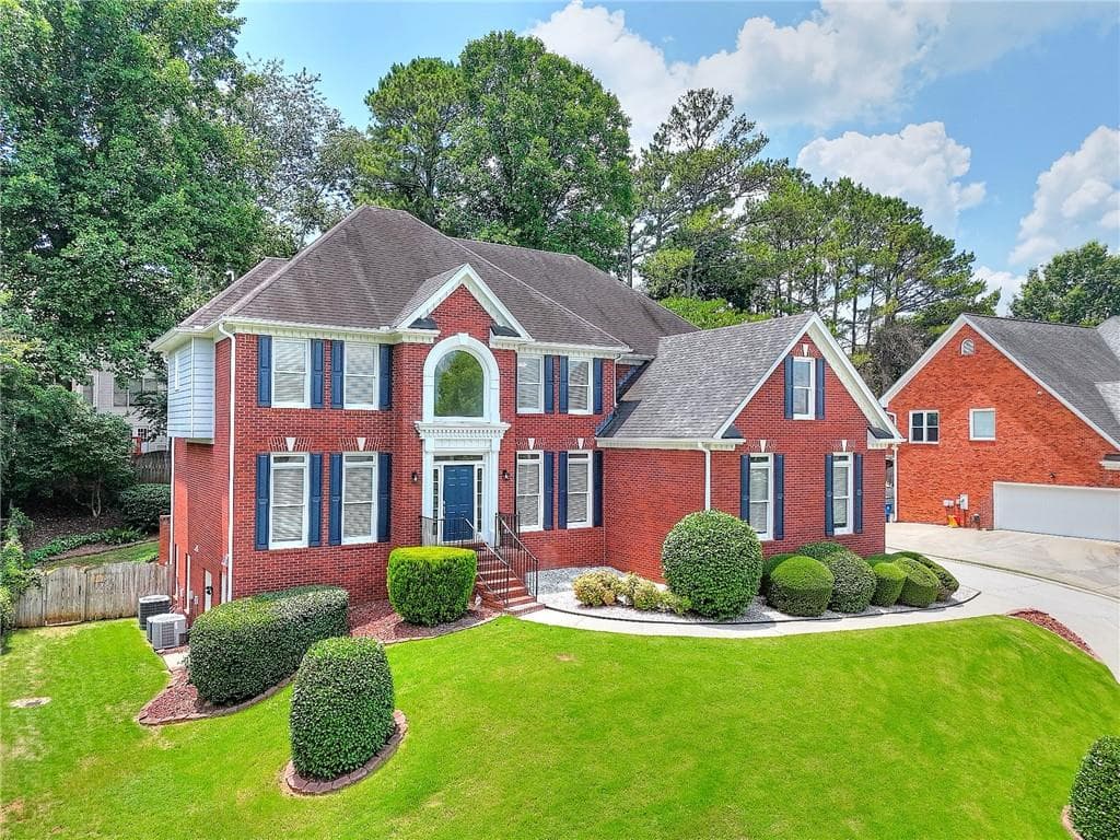 5 bedroom, 5 bathroom, 4,900 sq ft single family residence for sale at 1252 Braeburn Drive, Lawrenceville, GA 30044 — photo 4