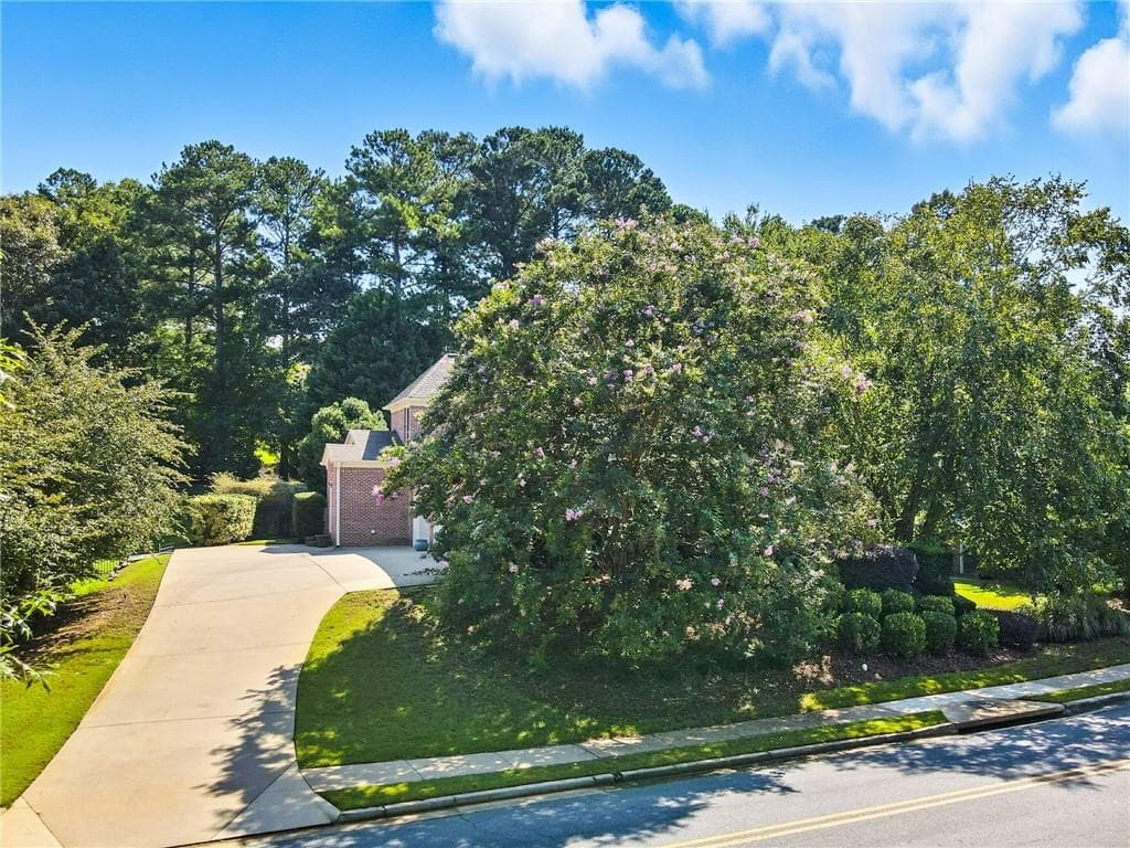 5 bedroom, 4 bathroom, 6,010 sq ft single family residence under contract at 1383 Bridge Mill Avenue, Canton, GA 30114 — photo 2
