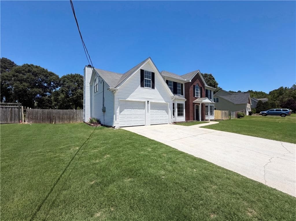 4 bedroom, 3 bathroom, 2,797 sq ft single family residence for sale at 2125 Rosewood Mill Court, Loganville, GA 30052 — photo 2