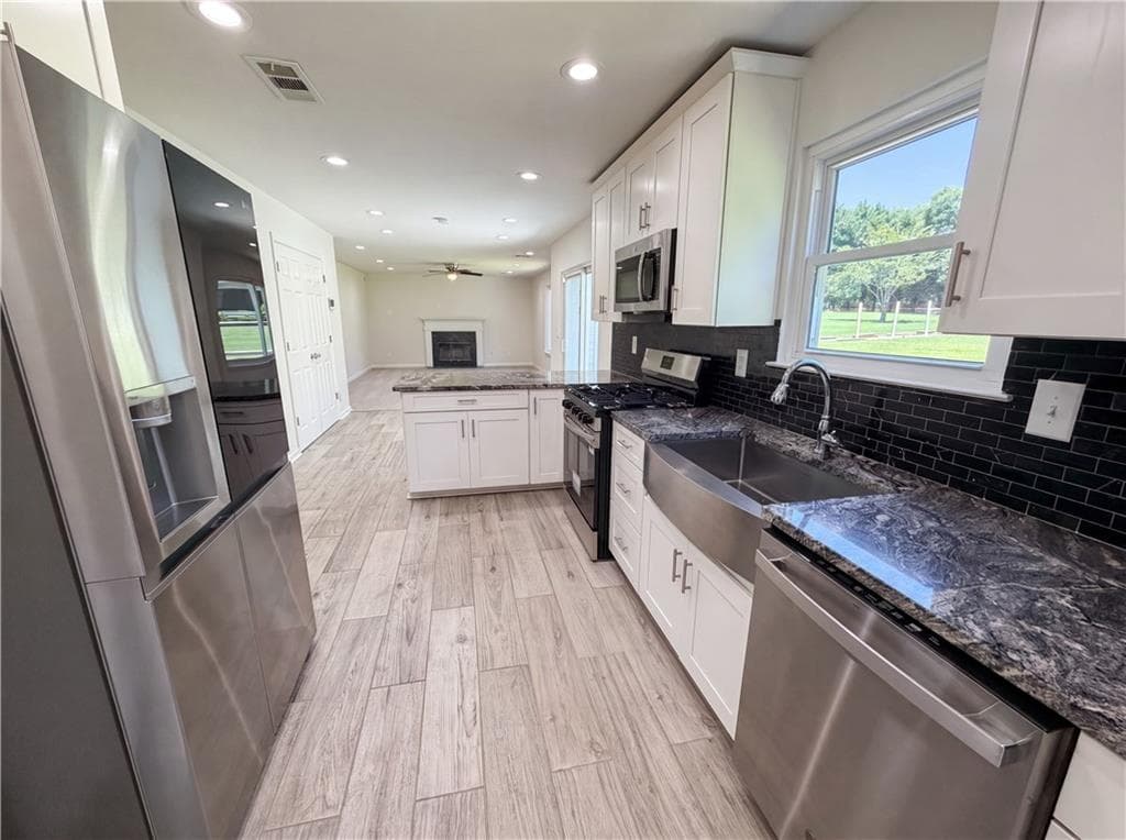 4 bedroom, 3 bathroom, 2,797 sq ft single family residence for sale at 2125 Rosewood Mill Court, Loganville, GA 30052 — photo 8