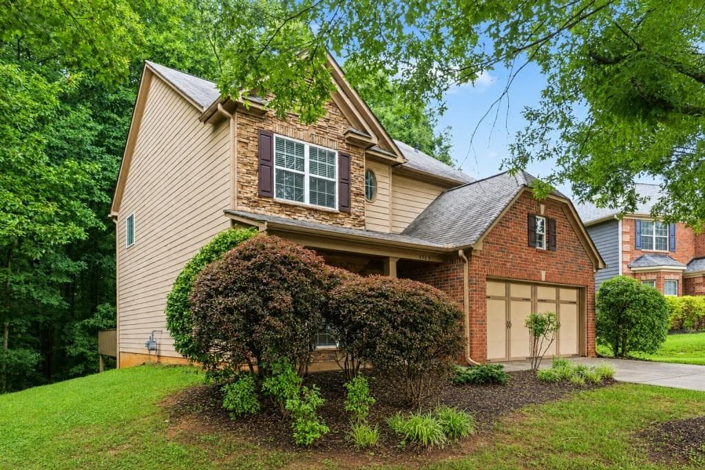 5 bedroom, 3 bathroom, 2,441 sq ft single family residence for sale at 4565 Evandale Way, Cumming, GA 30040 — photo 3