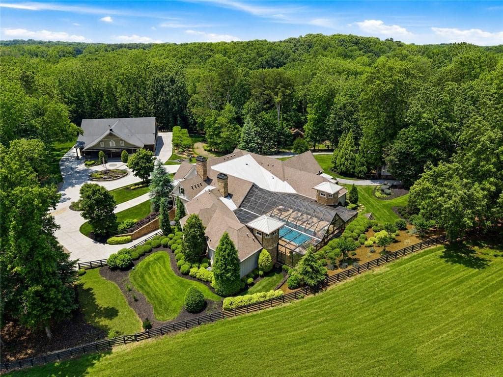 6 bedroom, 8 bathroom, 13,672 sq ft single family residence for sale at 5135 Howard Road, Cumming, GA 30040