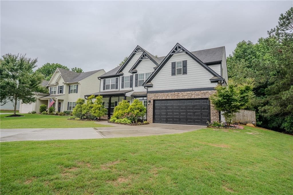 6 bedroom, 4 bathroom, 3,590 sq ft single family residence for sale at 1527 Washington Rose Avenue, Hoschton, GA 30548