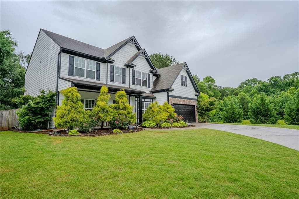 6 bedroom, 4 bathroom, 3,590 sq ft single family residence for sale at 1527 Washington Rose Avenue, Hoschton, GA 30548 — photo 2