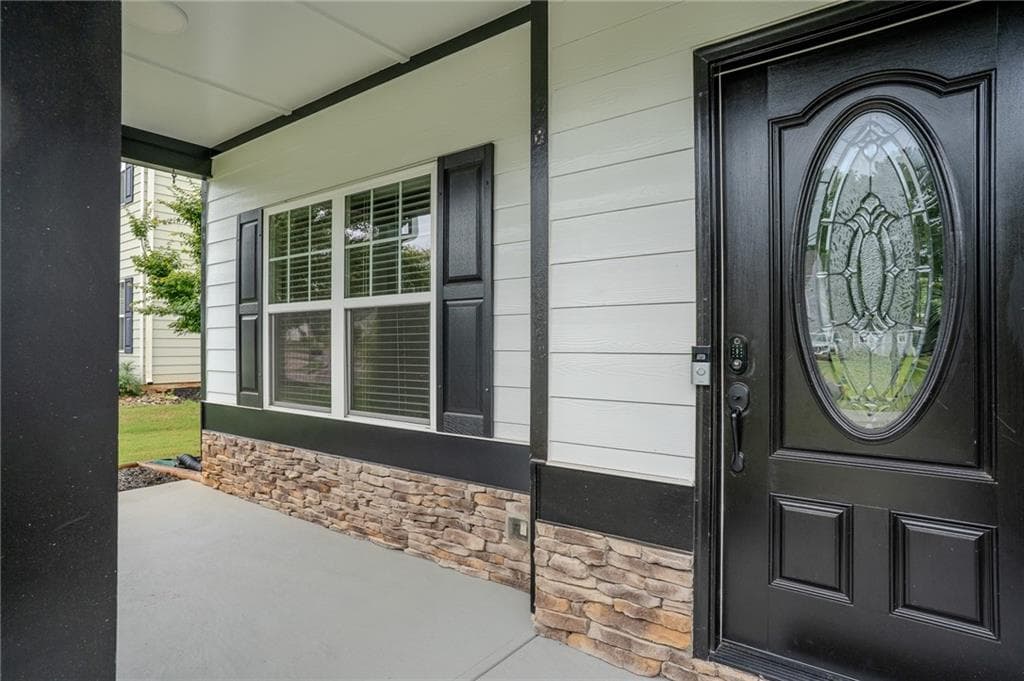 6 bedroom, 4 bathroom, 3,590 sq ft single family residence for sale at 1527 Washington Rose Avenue, Hoschton, GA 30548 — photo 6