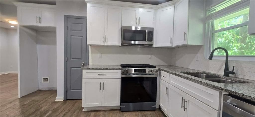 3 bedroom, 2 bathroom, 1,231 sq ft single family residence for sale at 2410 Macon Drive, Atlanta, GA 30315 — photo 6