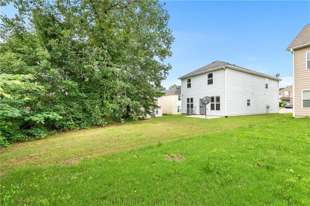 4 bedroom, 3 bathroom, 1,912 sq ft single family residence for sale at 7268 Loblolly Lane, Morrow, GA 30260 — photo 3