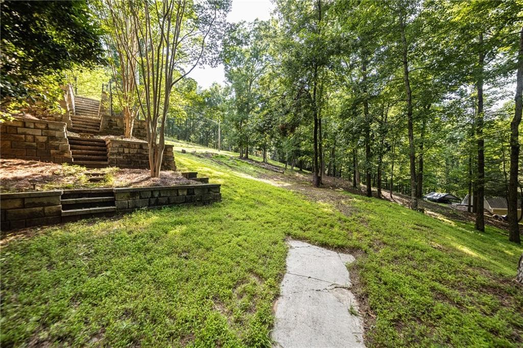 5 bedroom, 6 bathroom, 4,985 sq ft single family residence for sale at 7822 Beachwood Drive, Murrayville, GA 30564 — photo 10