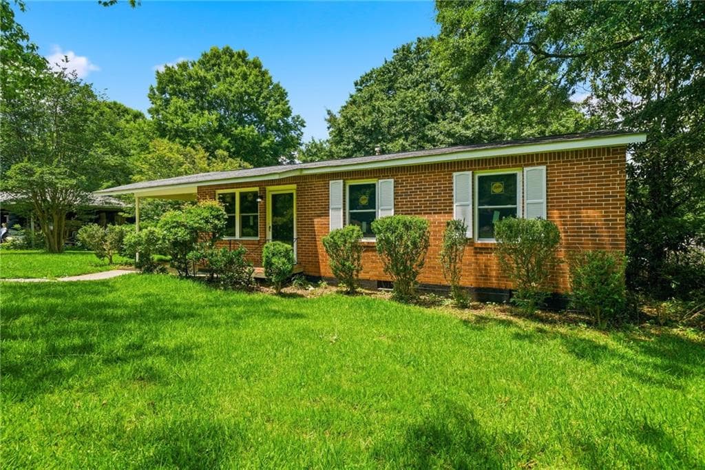 3 bedroom, 1 bathroom, 910 sq ft single family residence for sale at 4913 Bartlett Road, Forest Park, GA 30297 — photo 2