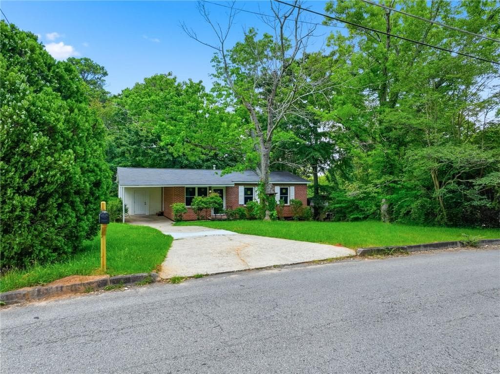 3 bedroom, 1 bathroom, 910 sq ft single family residence for sale at 4913 Bartlett Road, Forest Park, GA 30297 — photo 4