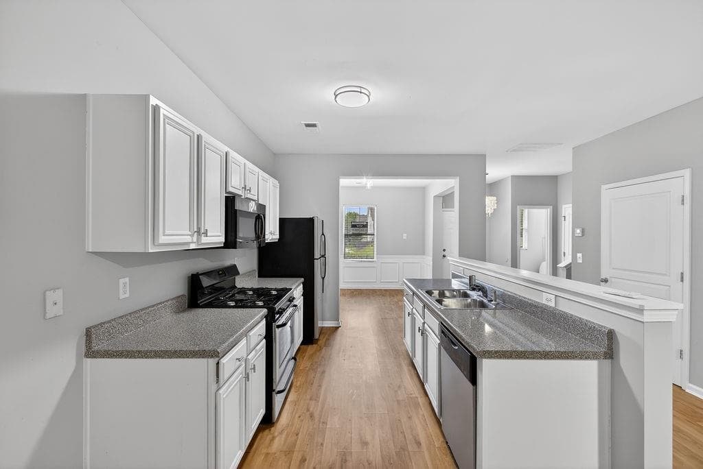3 bedroom, 3 bathroom, 1,706 sq ft condominium for sale at 1505 Ashbrooke Trace, Stone Mountain, GA 30083 — photo 7