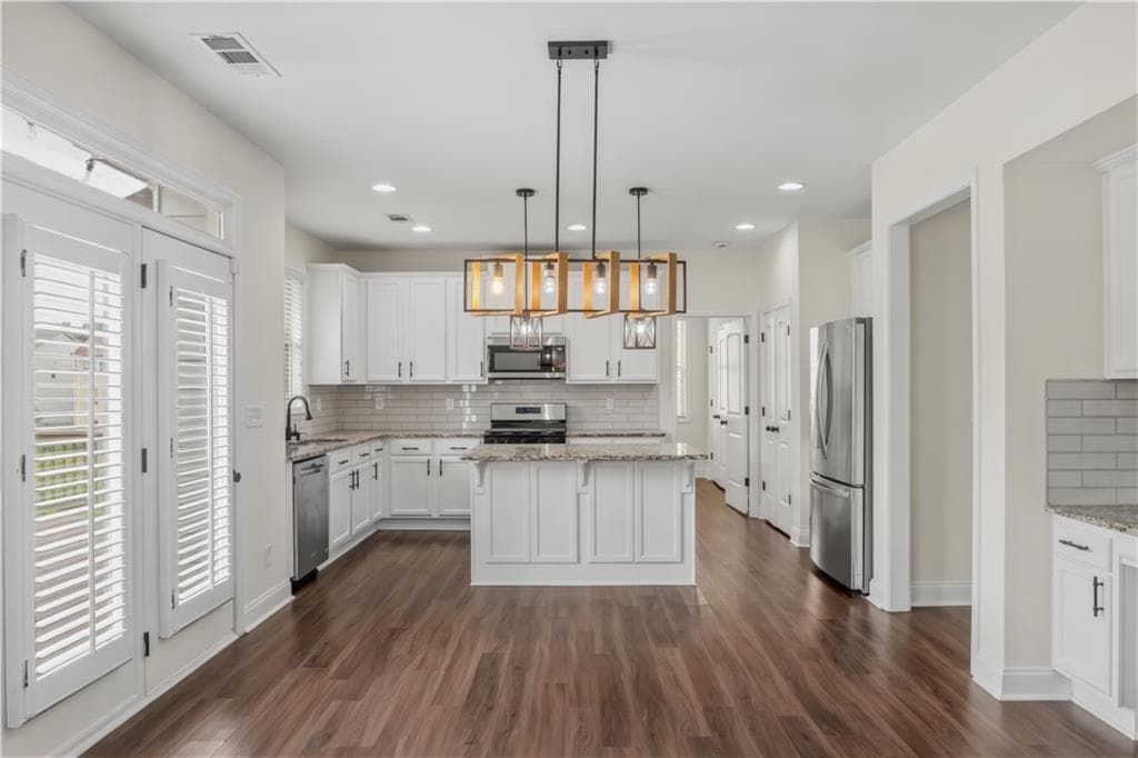 7 bedroom, 4 bathroom, 4,382 sq ft single family residence for sale at 2238 Well Springs Drive, Buford, GA 30519 — photo 9