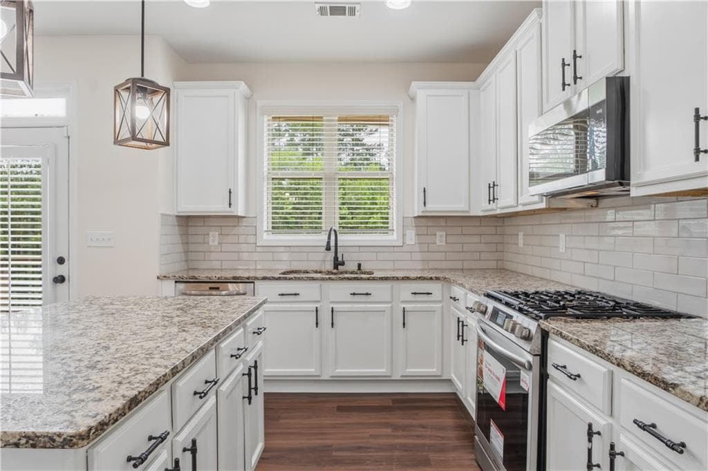 7 bedroom, 4 bathroom, 4,382 sq ft single family residence for sale at 2238 Well Springs Drive, Buford, GA 30519 — photo 10