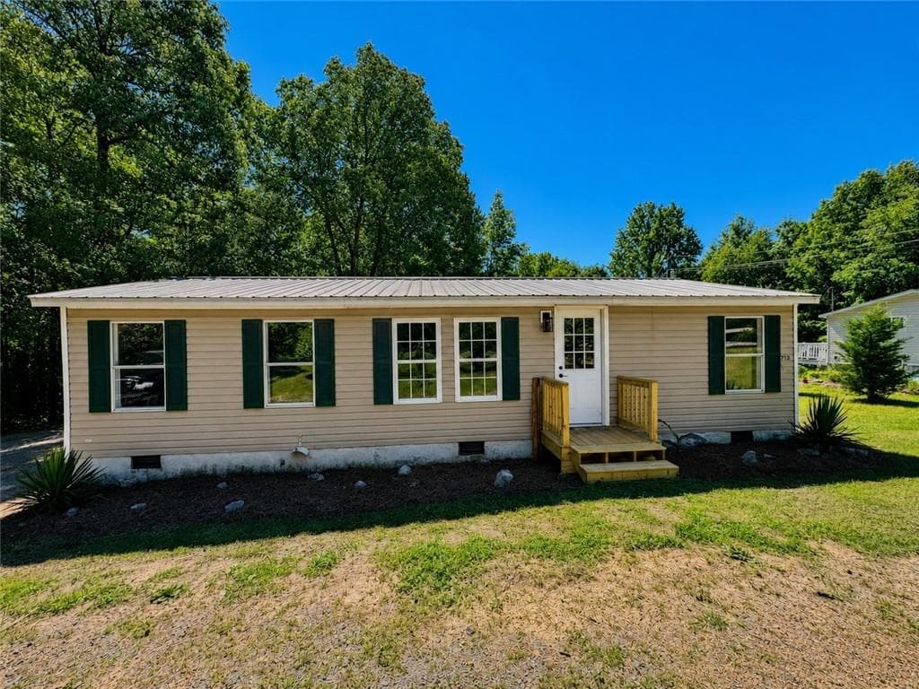 3 bedroom, 2 bathroom, 960 sq ft single family residence for sale at 713 Woods Road, Tunnel Hill, GA 30755