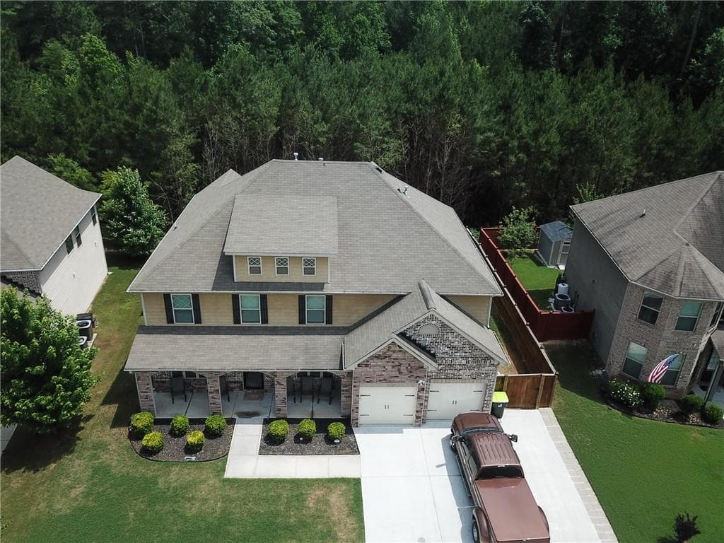 5 bedroom, 4 bathroom, 3,628 sq ft single family residence for sale at 5268 Rosewood Place, Fairburn, GA 30213 — photo 2