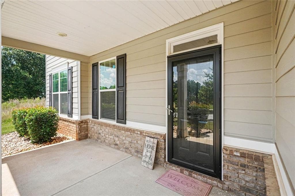 5 bedroom, 4 bathroom, 3,678 sq ft single family residence for sale at 8084 Louis Drive, Locust Grove, GA 30248 — photo 3