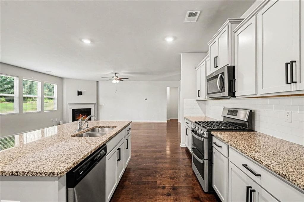 5 bedroom, 4 bathroom, 3,678 sq ft single family residence for sale at 8084 Louis Drive, Locust Grove, GA 30248 — photo 9