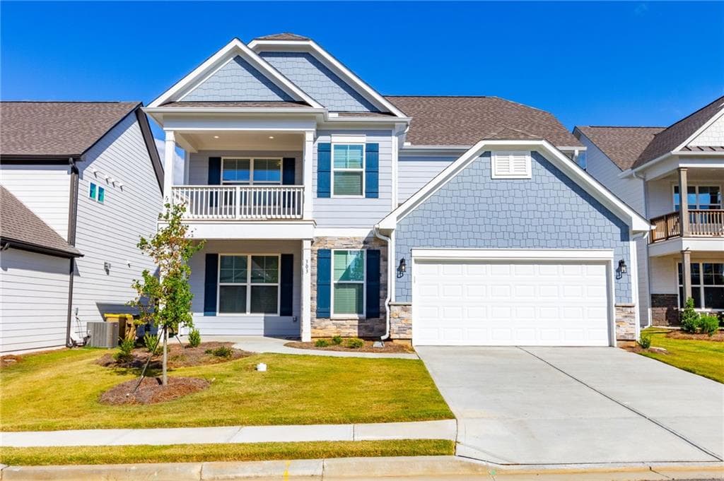 5 bedroom, 4 bathroom, 3,000 sq ft single family residence for sale at 303 Bull Shoals Way, Hoschton, GA 30548 — photo 1 of 28
