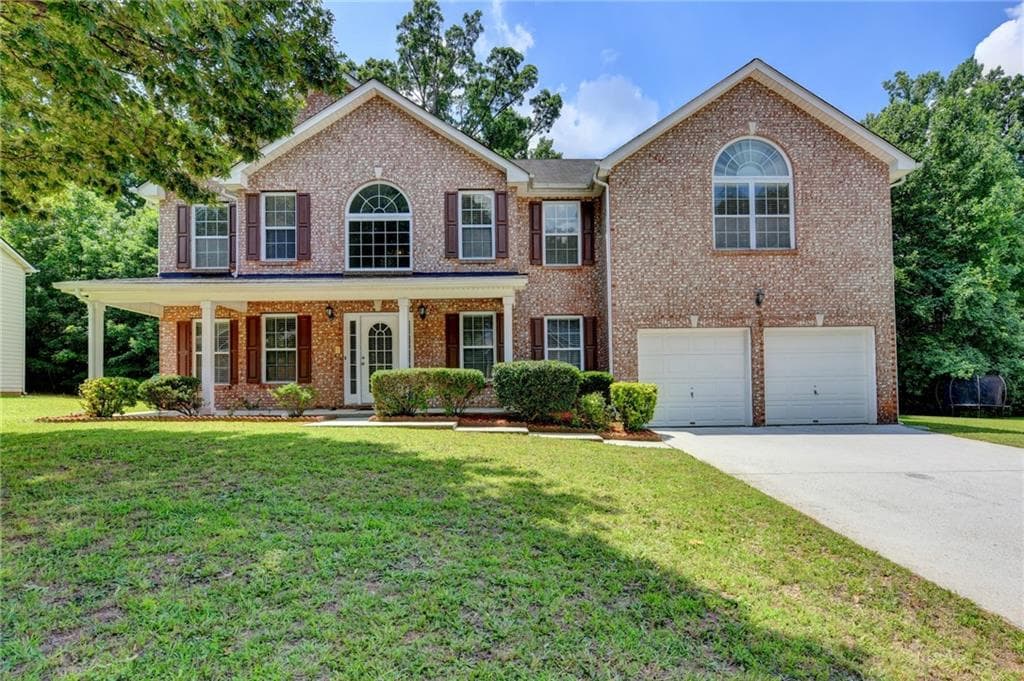 6 bedroom, 3 bathroom, 3,904 sq ft single family residence for sale at 5187 Miller Woods Trail, Decatur, GA 30035 — photo 2