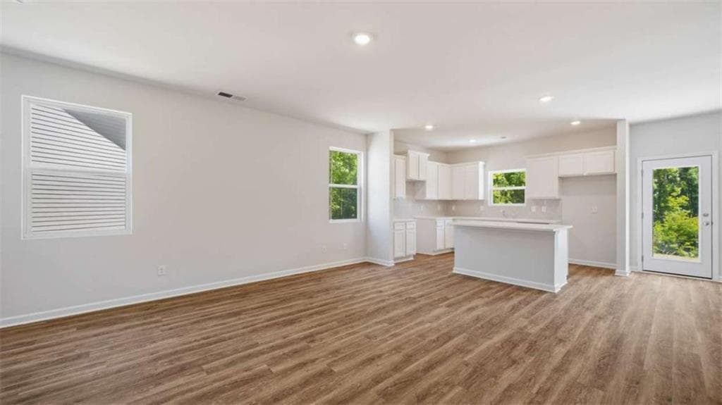 4 bedroom, 3 bathroom single family residence for sale at 11970 Aukerman Way, Hampton, GA 30228 — photo 4