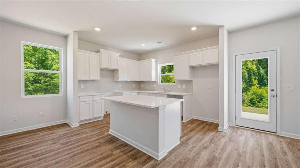 4 bedroom, 3 bathroom single family residence for sale at 11970 Aukerman Way, Hampton, GA 30228 — photo 6