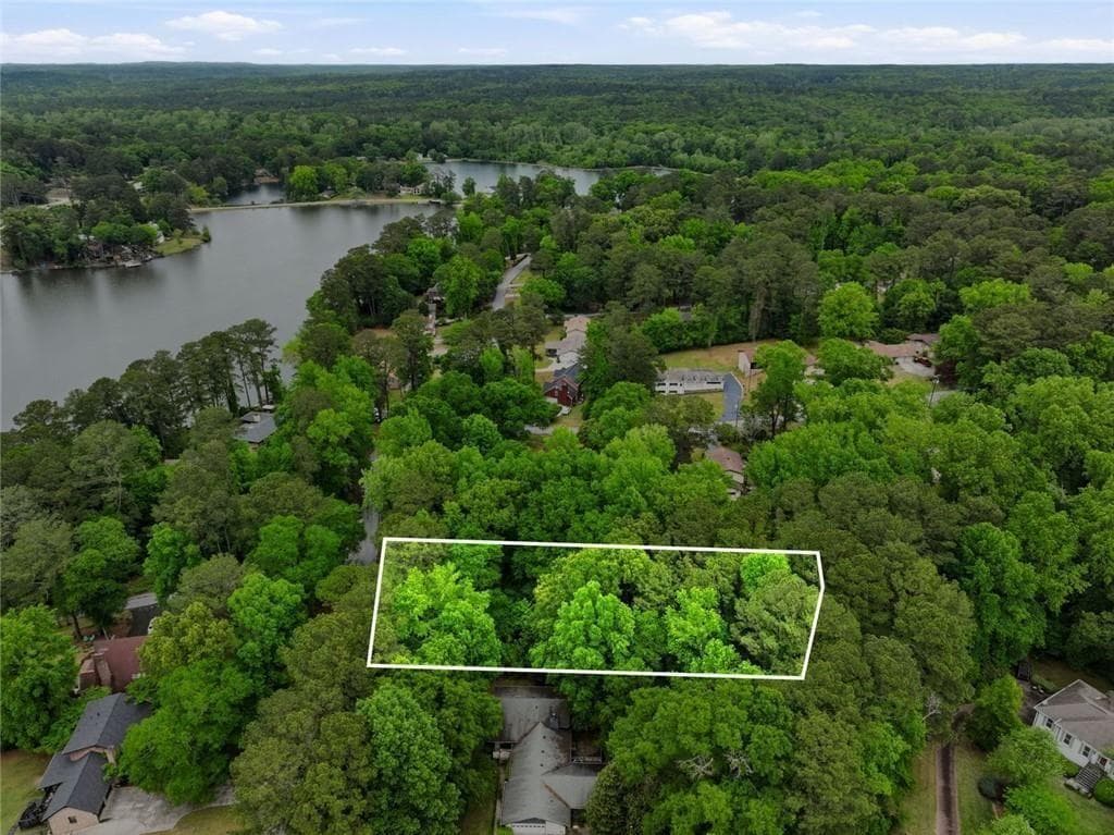 unimproved land for sale at 2569 Lake Capri Drive, Conyers, GA 30012 — photo 1 of 7