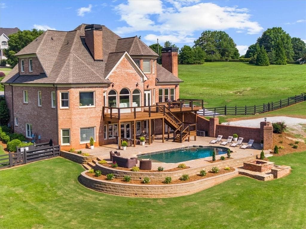 6 bedroom, 6 bathroom, 6,448 sq ft single family residence under contract at 7130 Little Brook Lane, Cumming, GA 30041