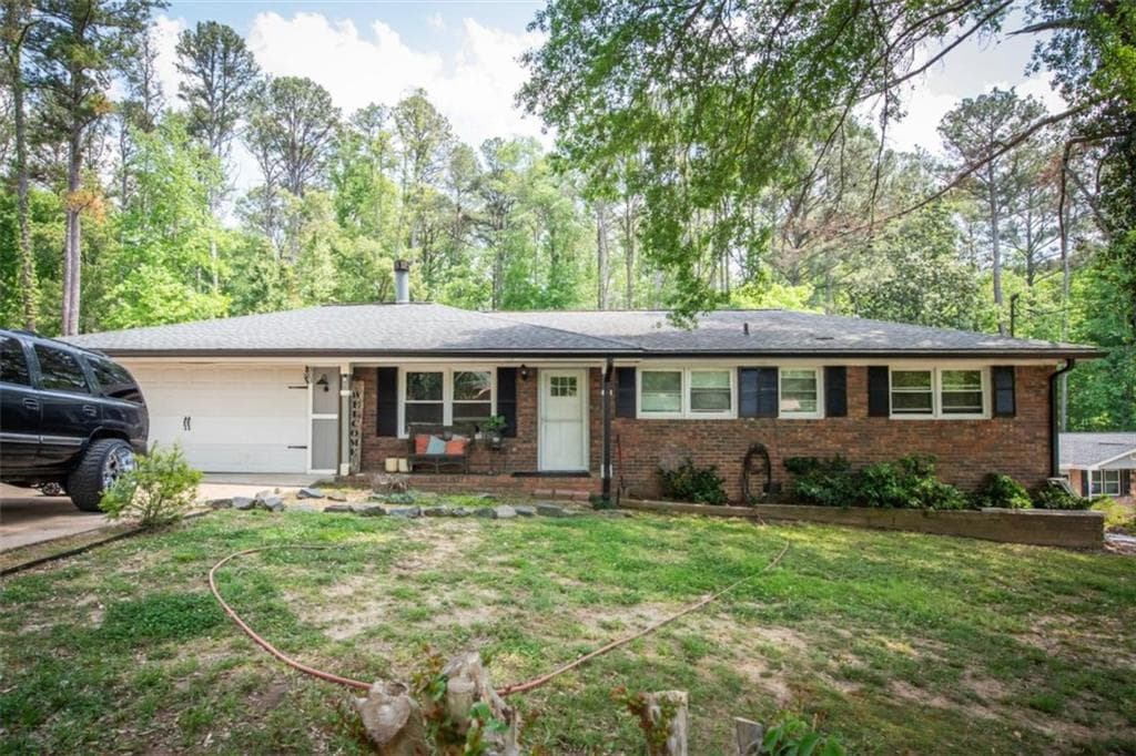 4 bedroom, 2 bathroom, 1,578 sq ft single family residence for sale at 303 Wildwood Drive, Dallas, GA 30132
