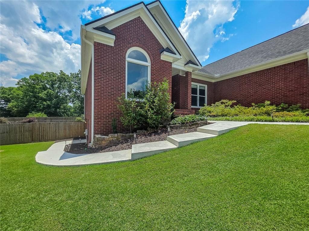 4 bedroom, 5 bathroom, 4,352 sq ft single family residence for sale at 1475 Barrett Place Lane, Lawrenceville, GA 30043 — photo 4