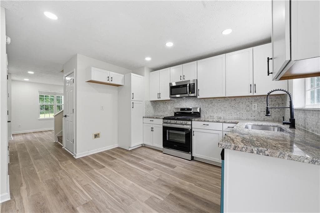 5 bedroom, 3 bathroom, 2,220 sq ft single family residence for sale at 483 Mephisto Circle, Lawrenceville, GA 30046 — photo 7