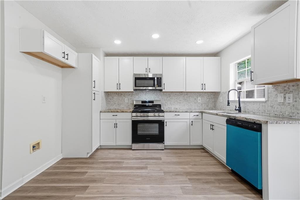 5 bedroom, 3 bathroom, 2,220 sq ft single family residence for sale at 483 Mephisto Circle, Lawrenceville, GA 30046 — photo 8